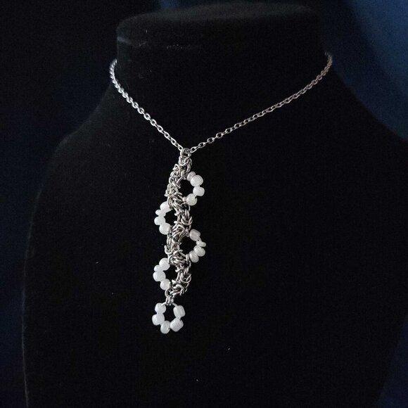 Hand Crafted Jewelry - Unique white pearl and silver snake necklace with a small silver chain